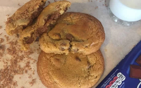 chocolate chip cookies and a broken cookie with chocolate