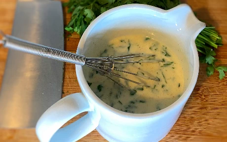 parsley sauce in a sauce boat